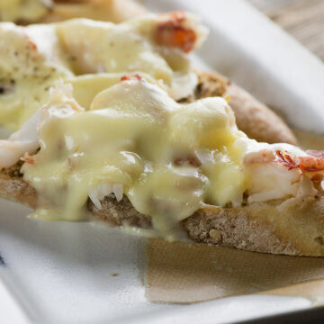 Grilled Lobster Brie Sandwishes on a platter.