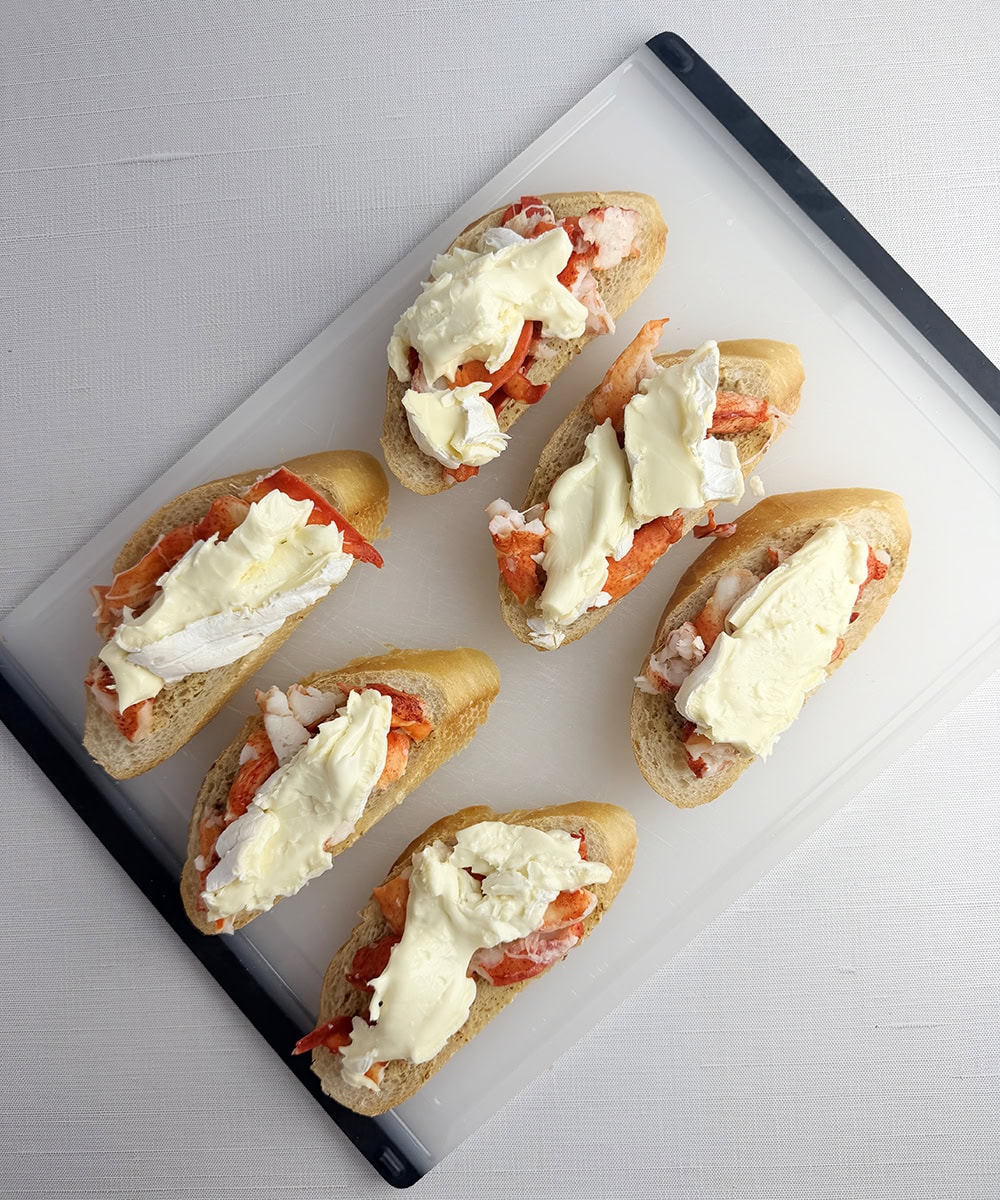 Lobster grilled cheese sandwiches ready for the oven.