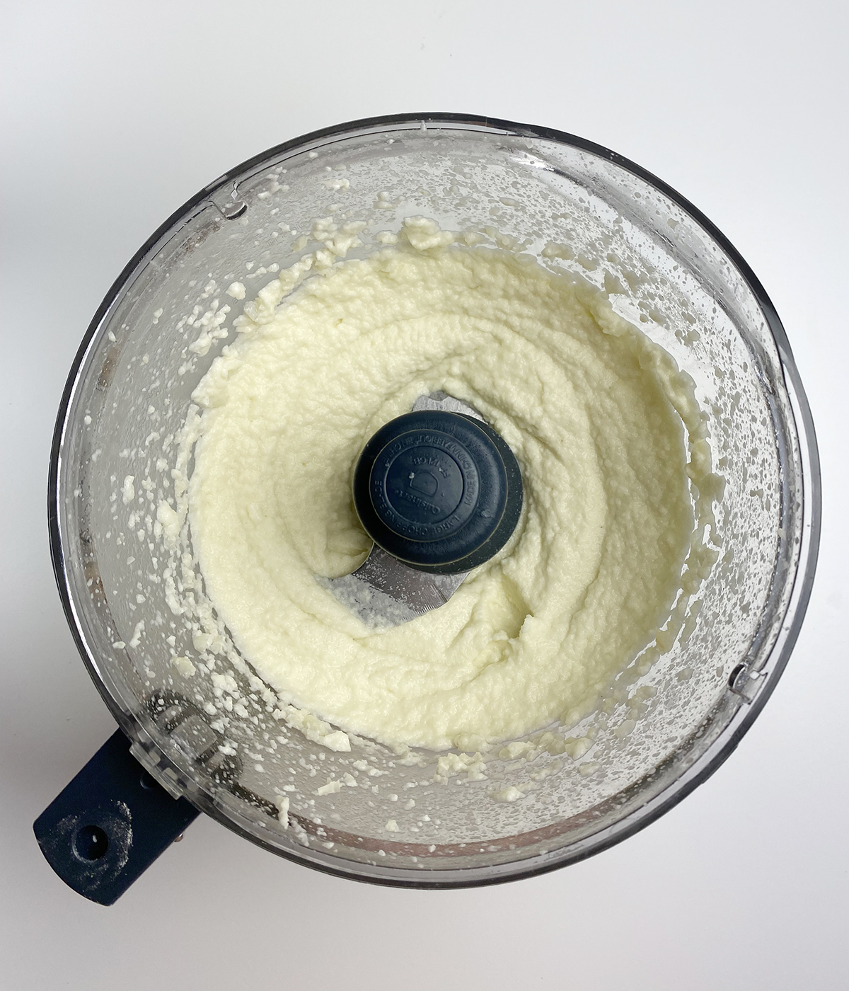 Whipped cauliflower in a food processor.