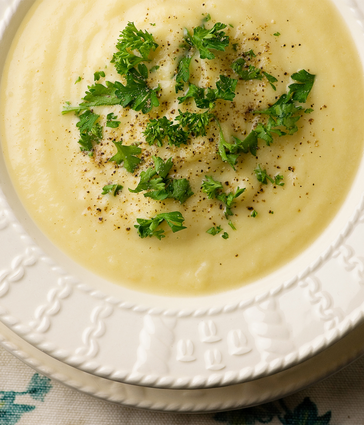 Cauliflower cheese soup in a bowl.