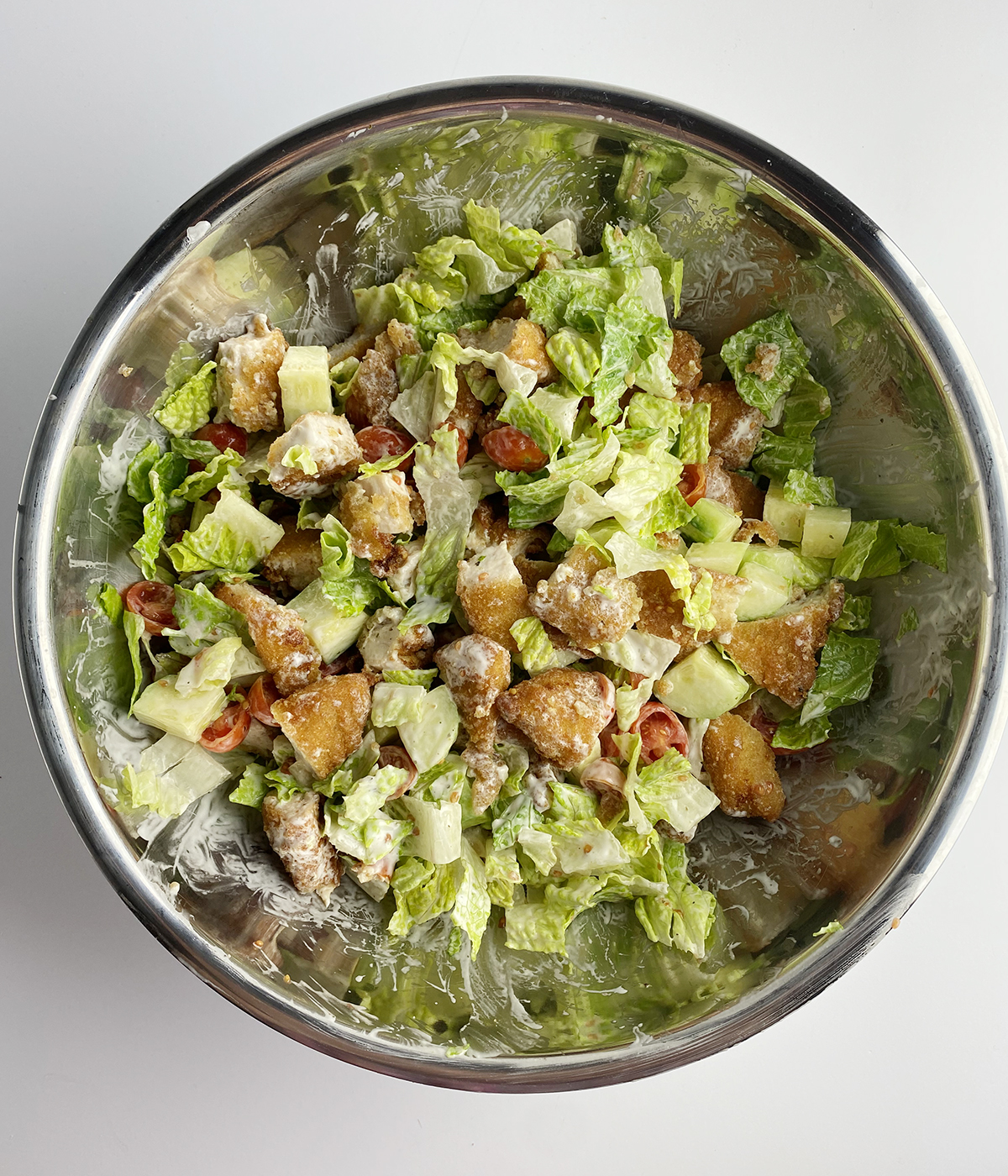 Fried chicken salad mixture in a bowl.
