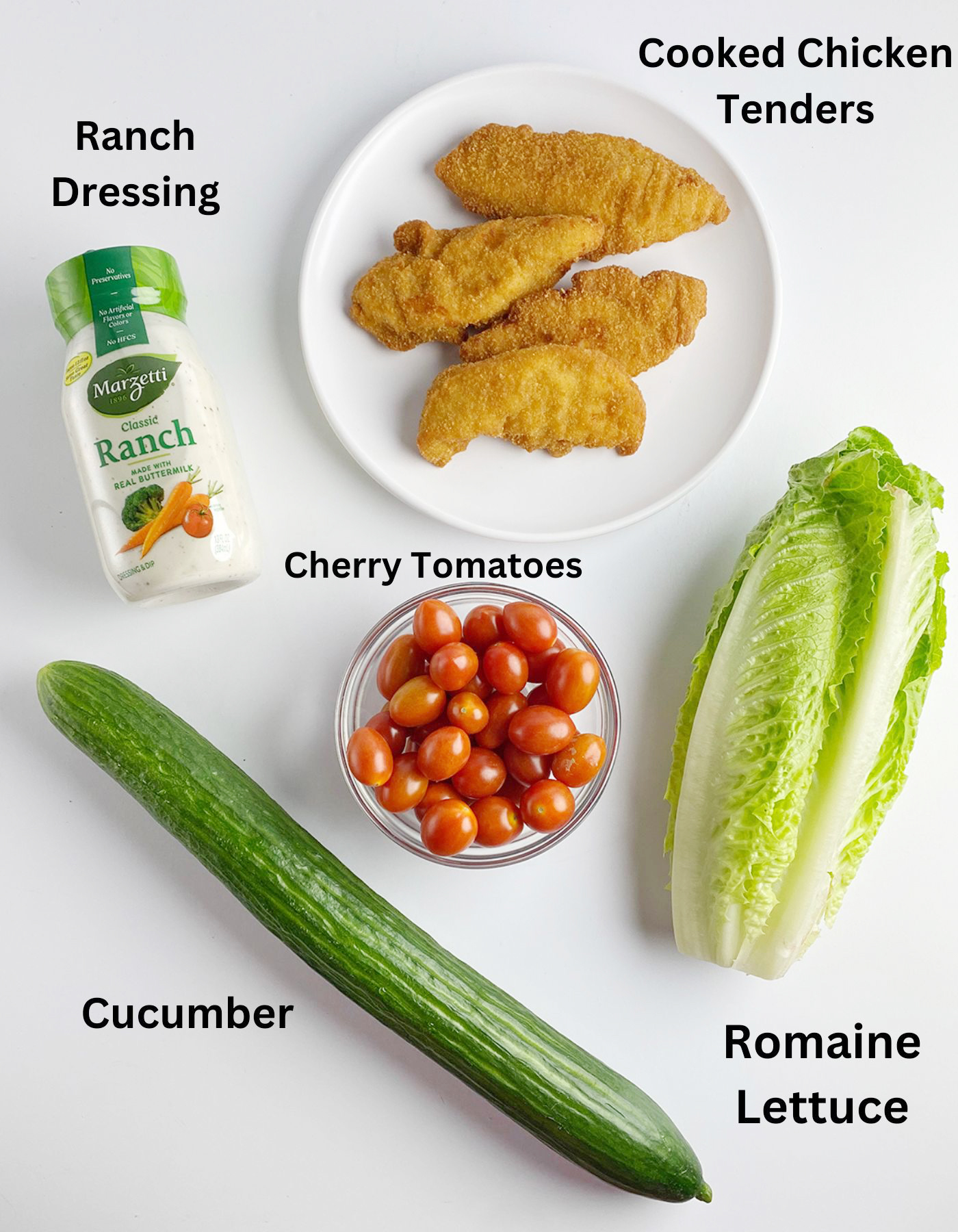 Ingredients for shortcut fried chicken salad on a counter.