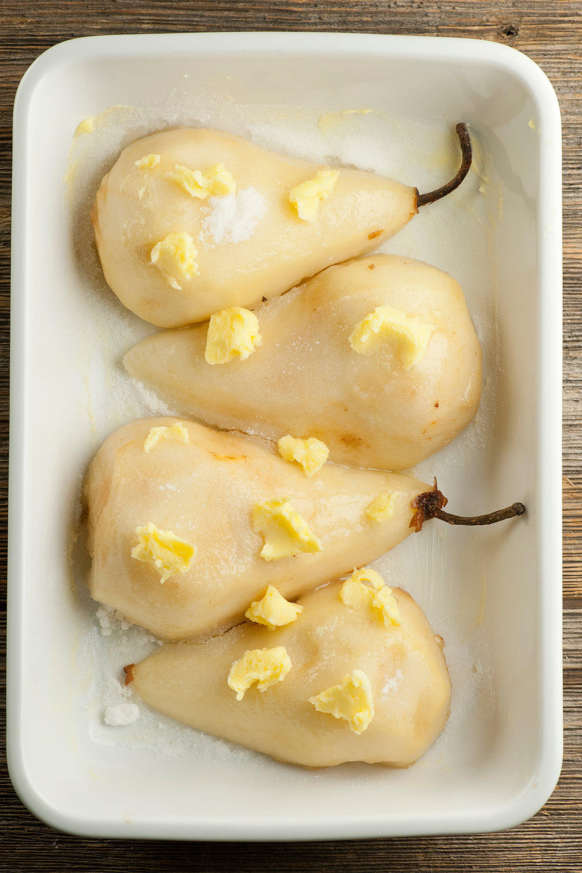 Pears in casserole dish ready for baking.