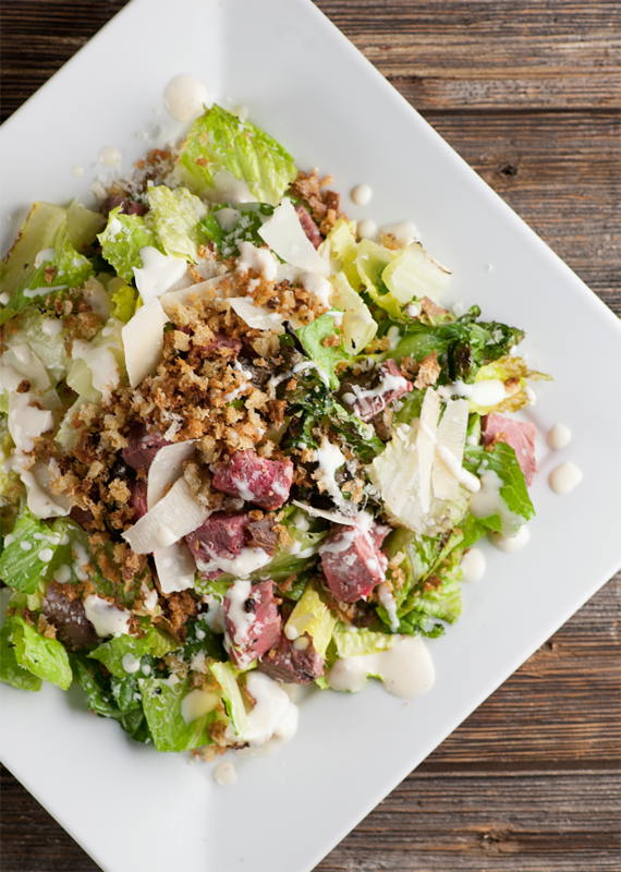 Steak Caesar Salad on a plate.
