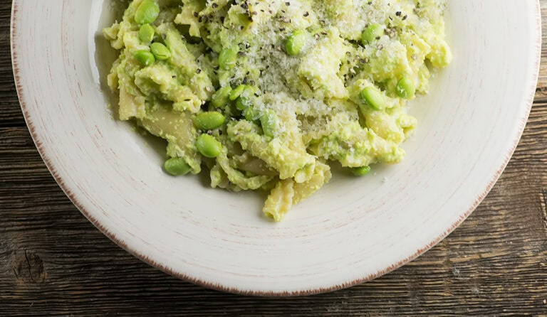 Bowl of pasta with edamame pesto.