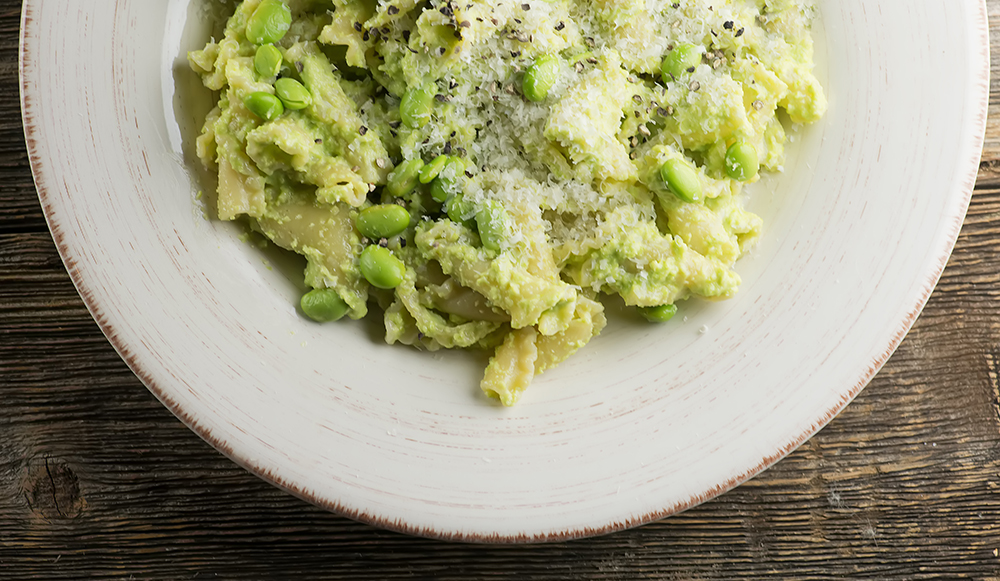 Bowl of pasta with edamame pesto.