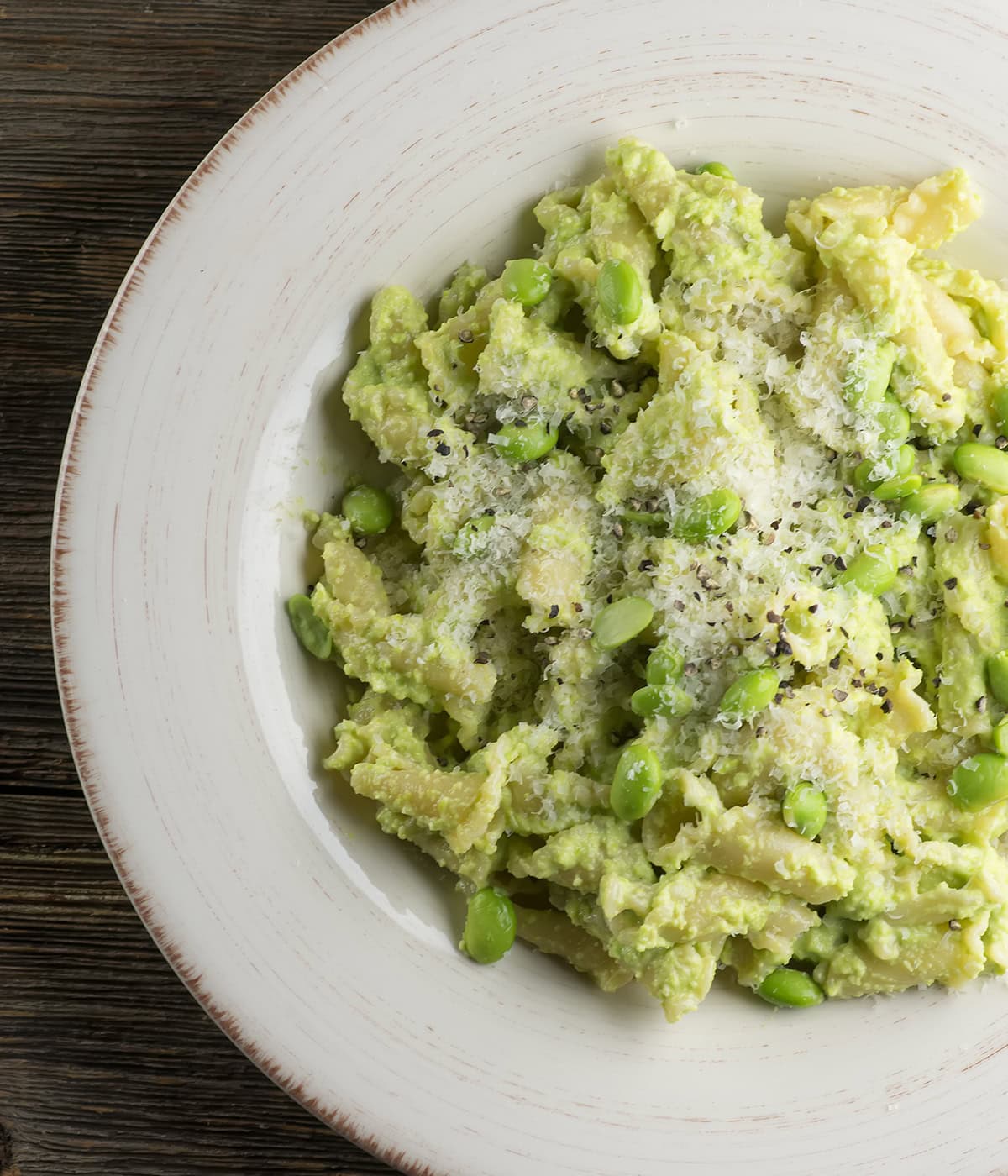 Pasta with Edamame pesto on a plate.