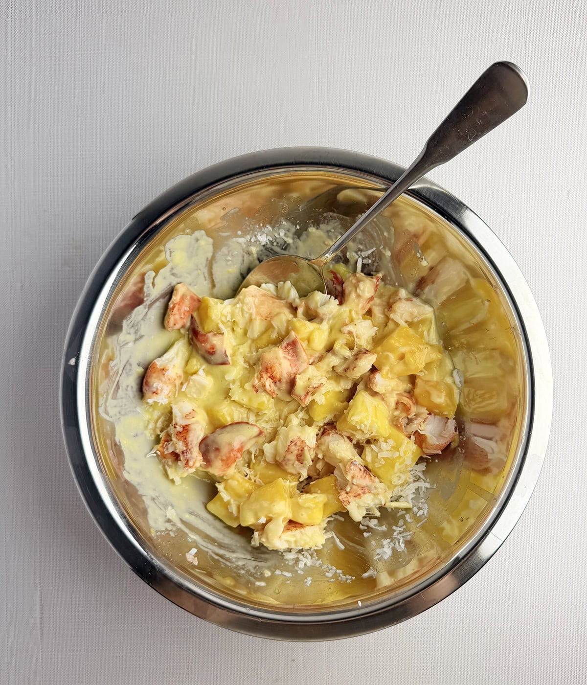 Lobster mango salad in a bowl.