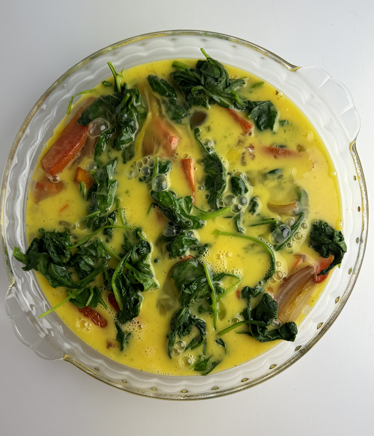 Roasted vegetable frittata ready for the oven.