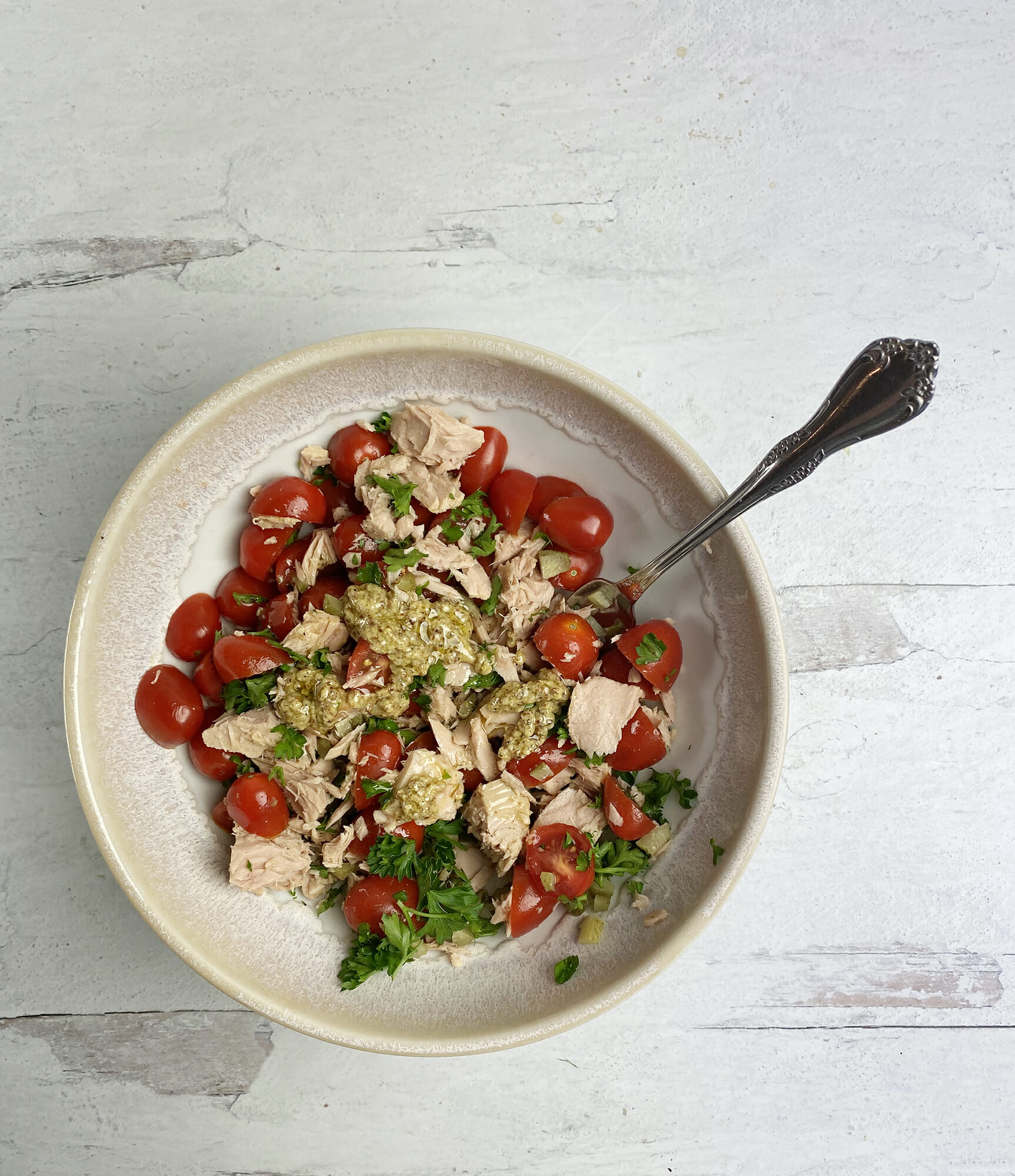 Tuna salad with tomatoes and mustard dressing.