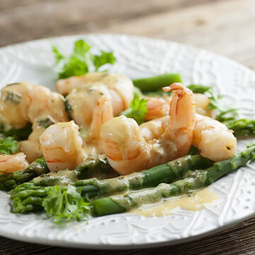 Mustard shrimp scampi on a plate.