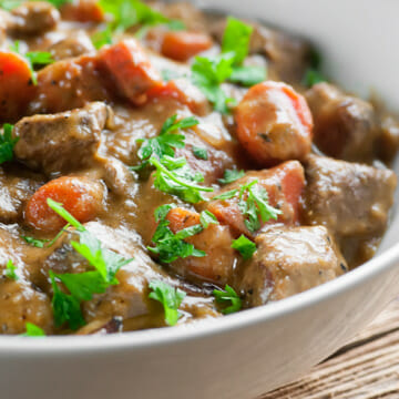 Creamy Mustard Beef Stew in a bowl.