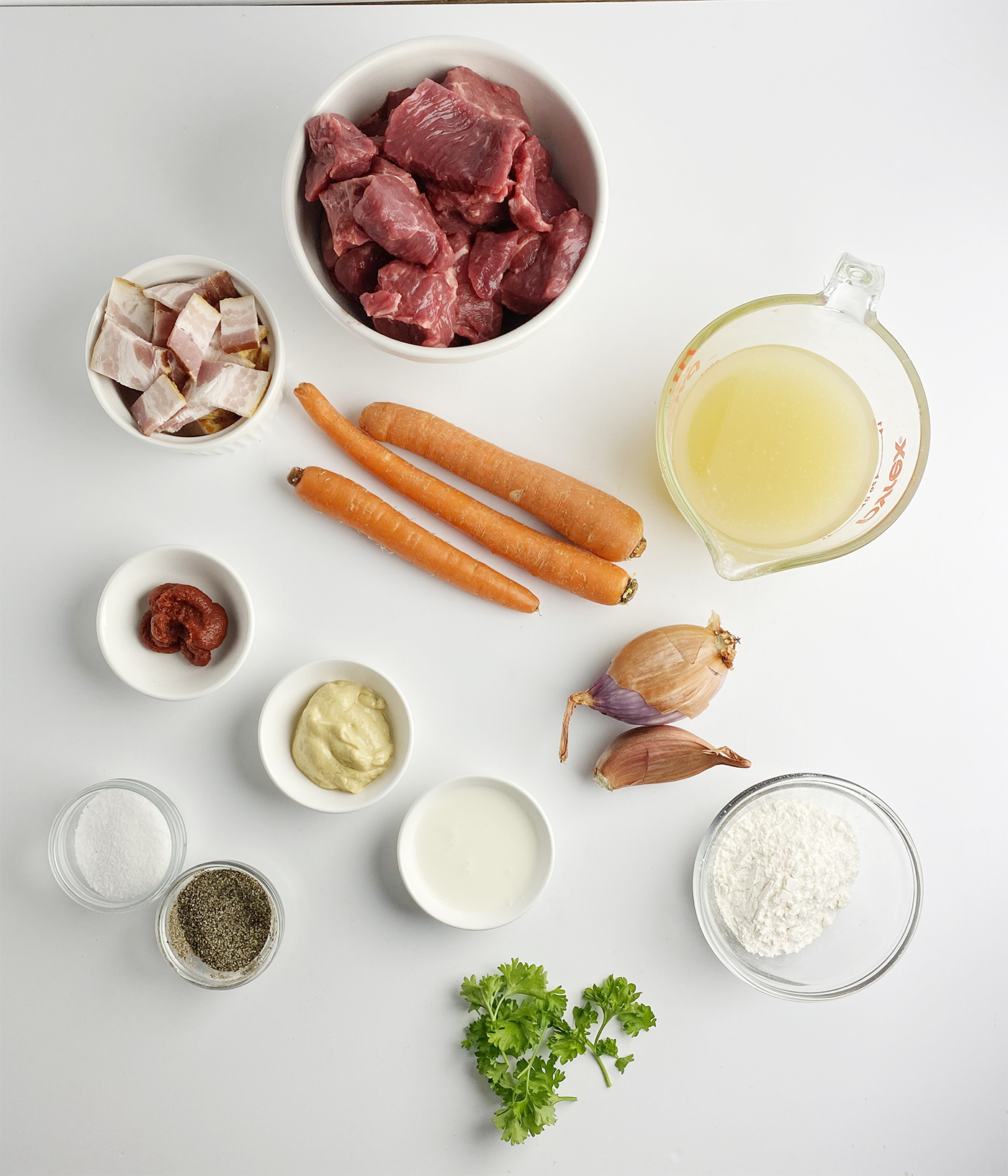 Ingredients needed to make creamy mustard beef stew.