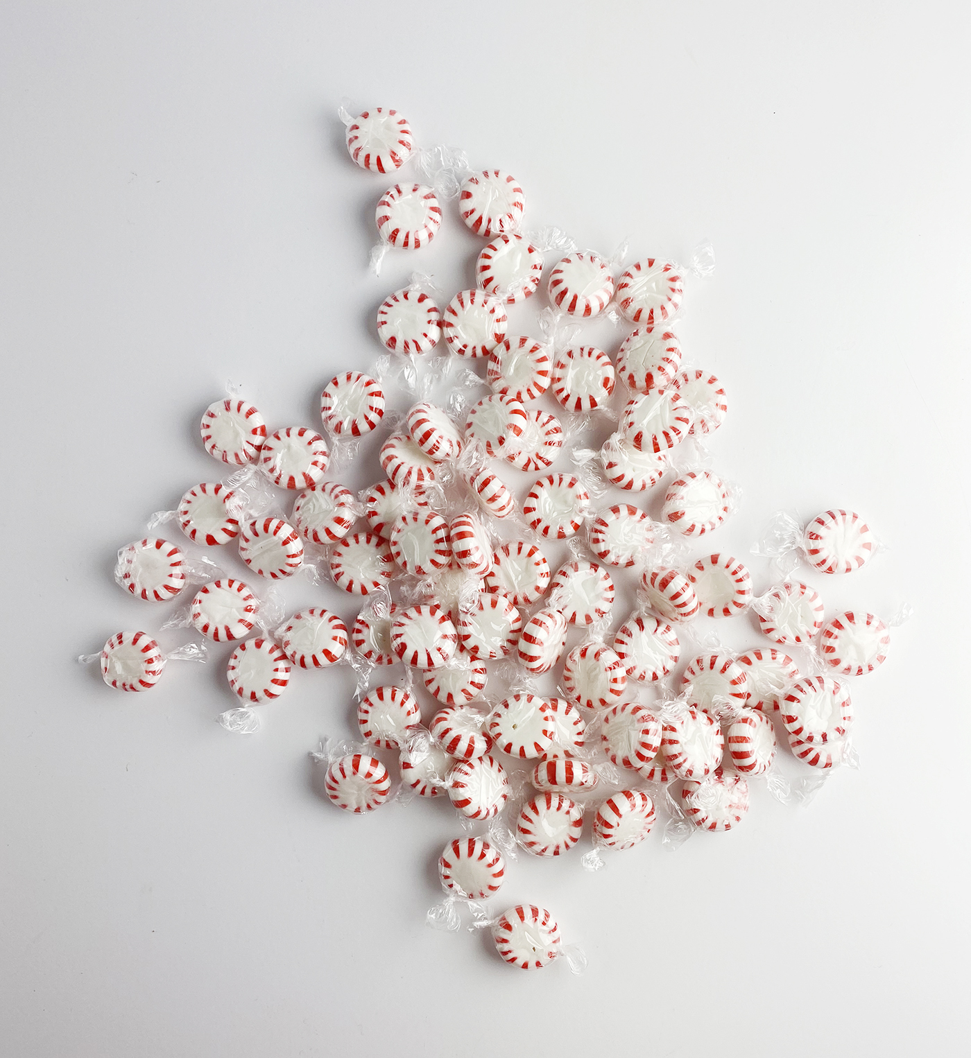 Peppermint candies on a white counter.