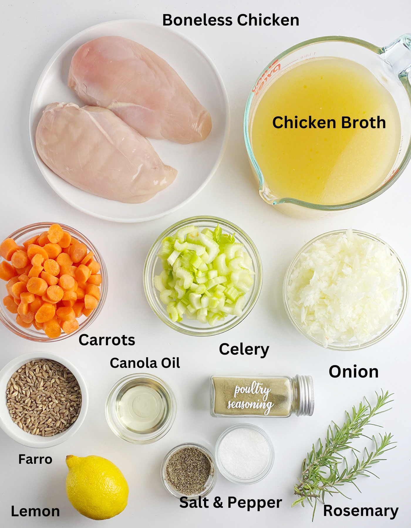 Ingredients for rosemary chicken soup on a counter.