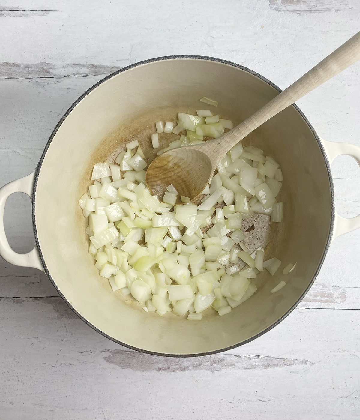 Sauteed onions in a pot.