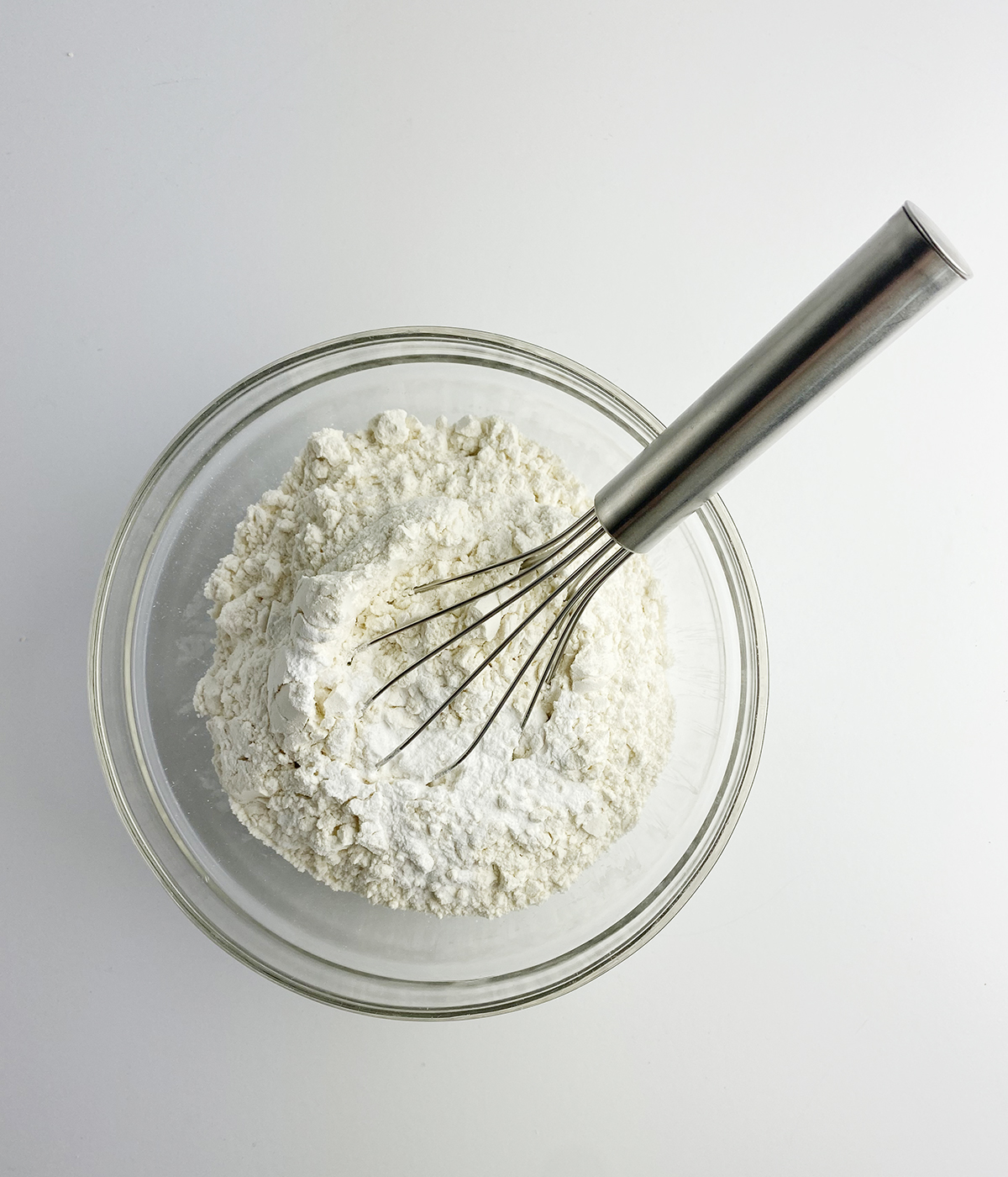 Flour baking powder mixture in a bowl.