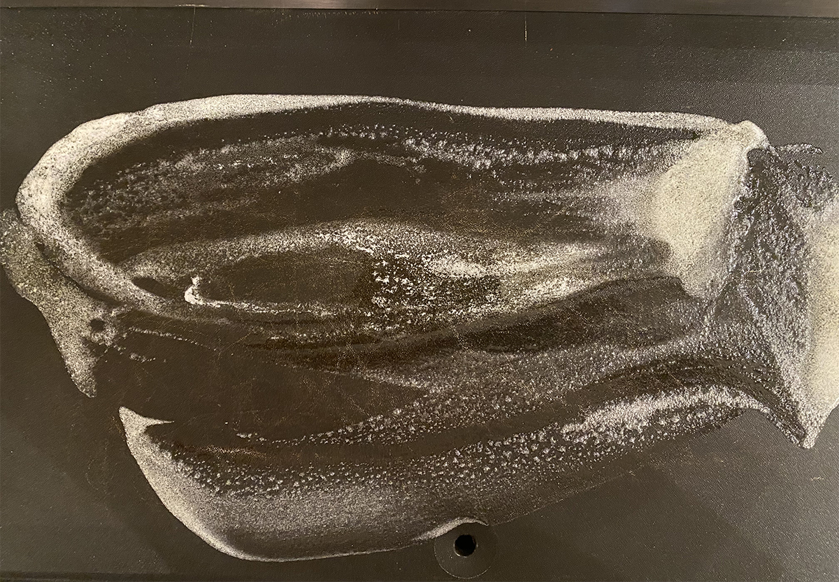 Melted butter on a griddle.