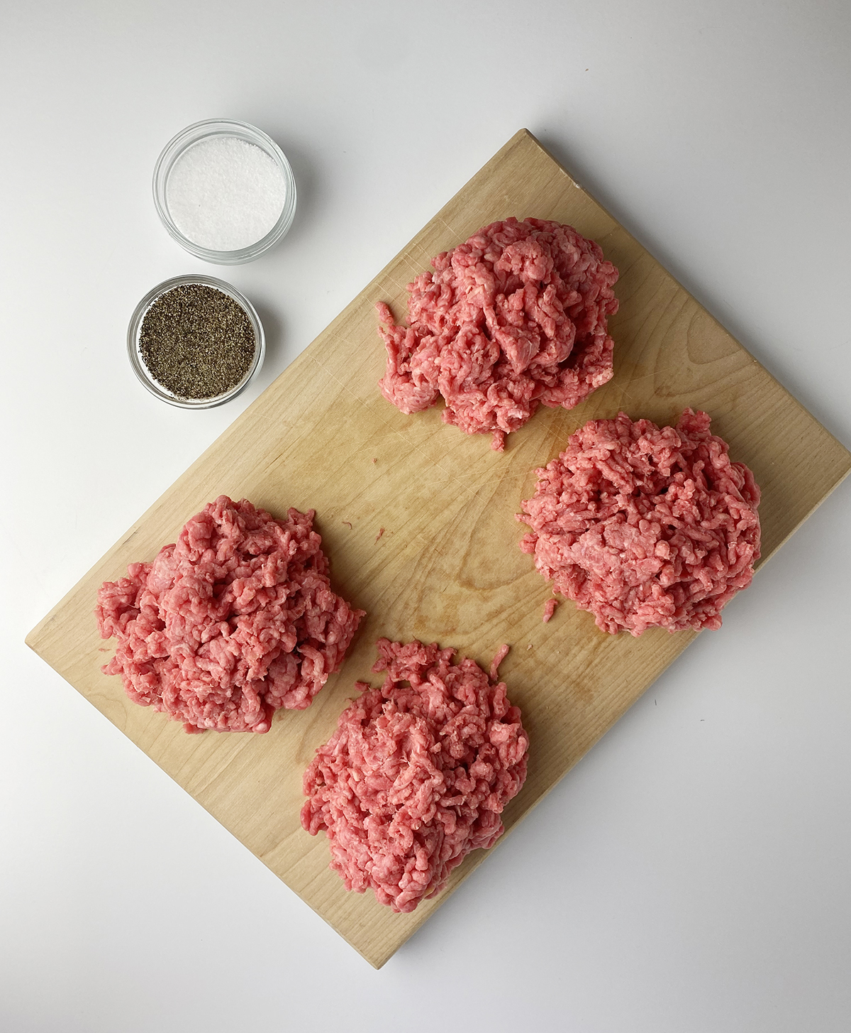 piles of ground beef for burgers
