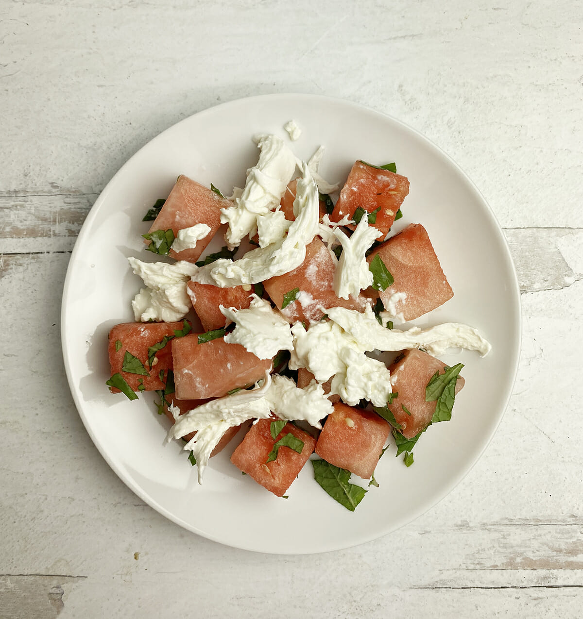 watermelon with burrata cheese and herbs