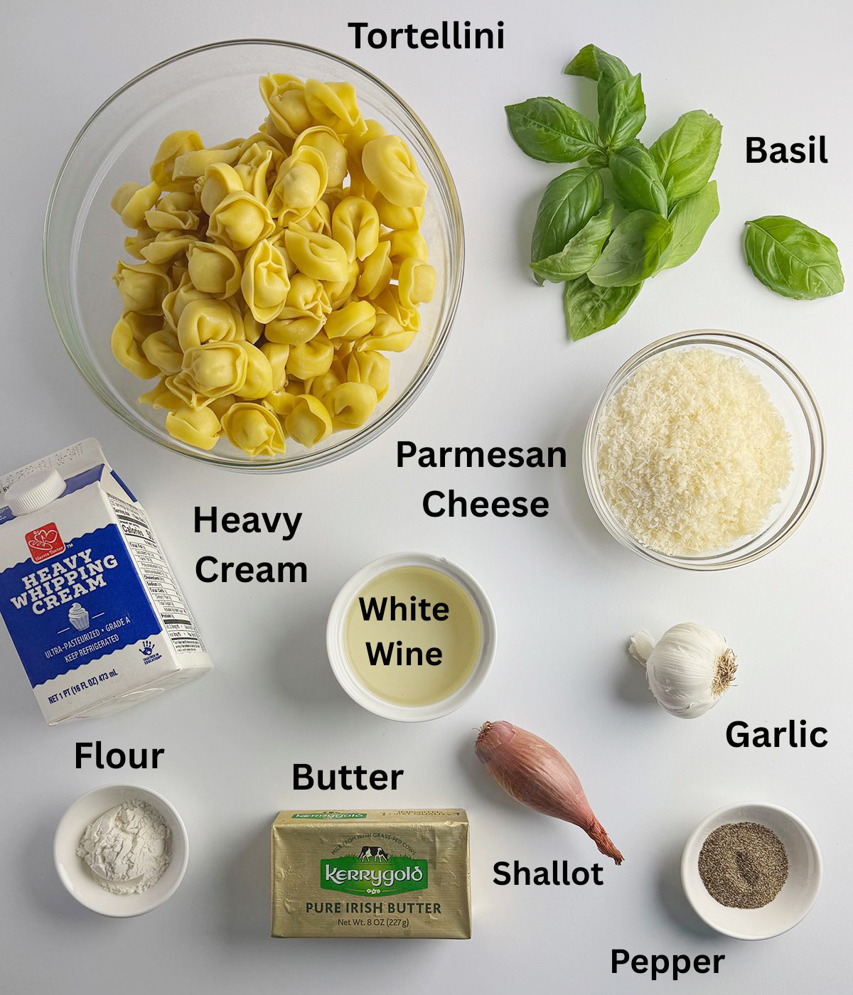 Ingredients needed to make Tortellini with creamy basil sauce.