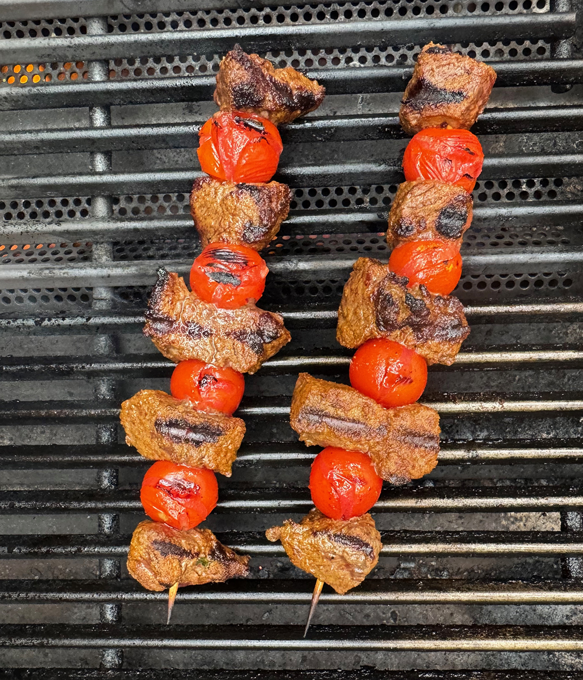 Steak skewers on the grill.