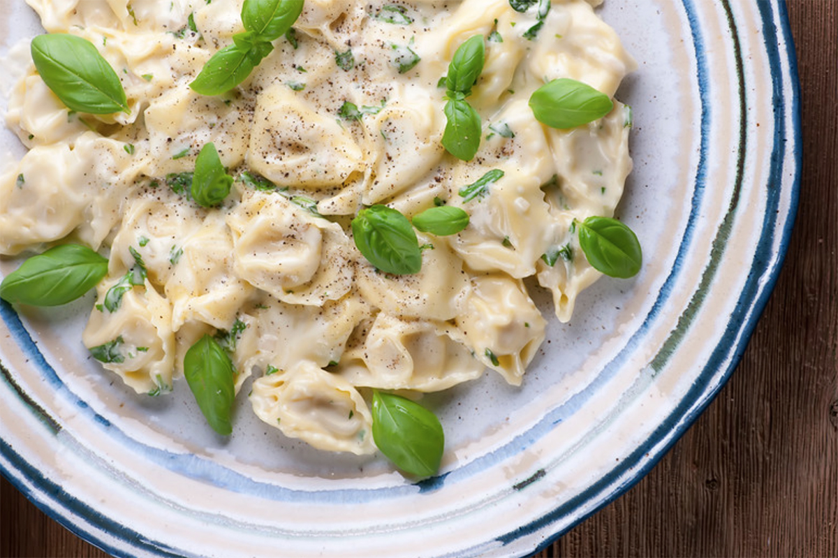 tortellini with basil cream sauce Tortellini with creamy basil sauce.
