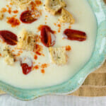 Cheddar cheese soup in a bowl.