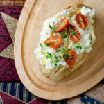 baked potato with ricotta and tomatoes