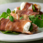 Prosciutto Cheese Rolls on a plate.