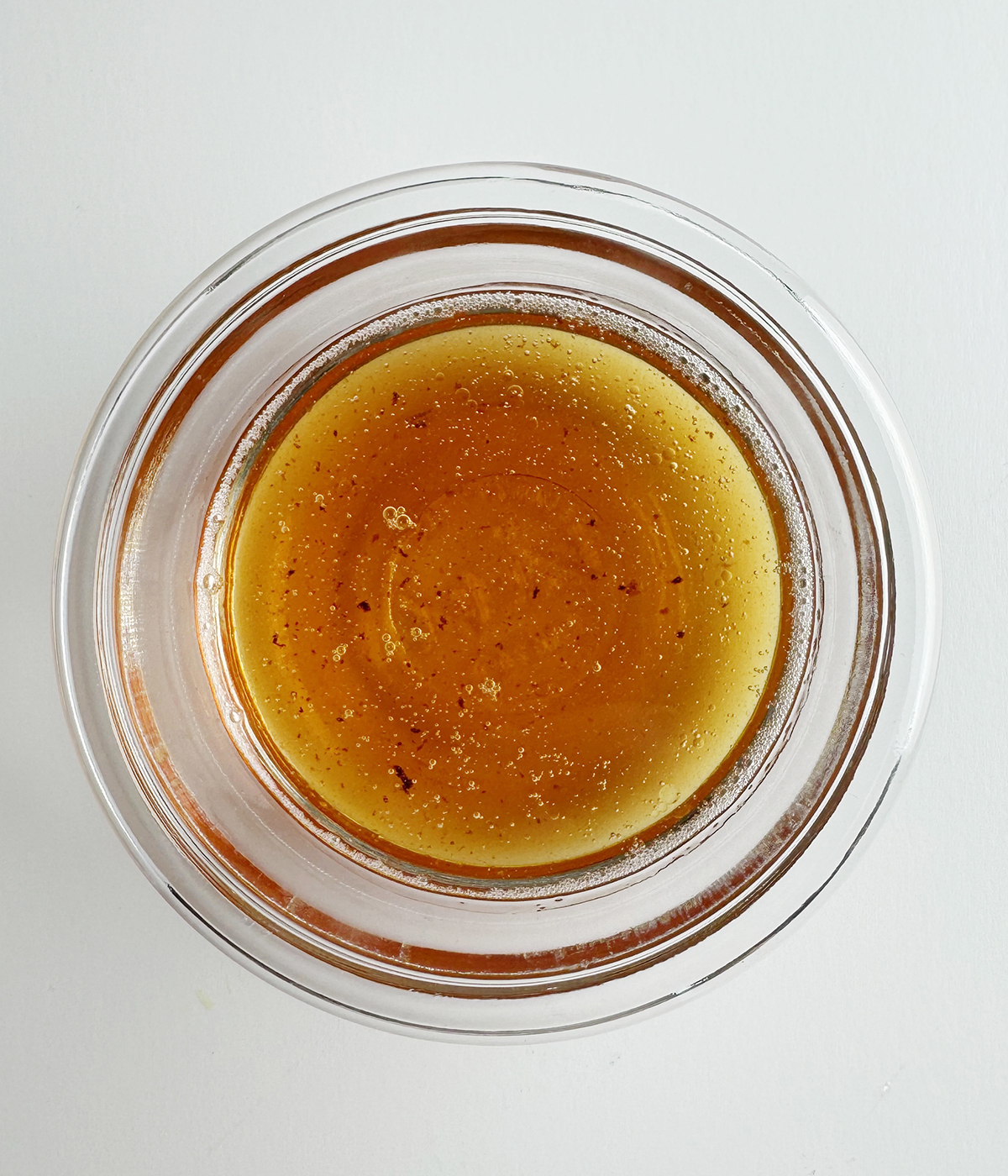 Bacon dripping dressing in a jar.