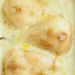 Pears in vanilla cream sauce in a casserole.