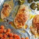 One pan roasted chicken and vegetables on a baking sheet.