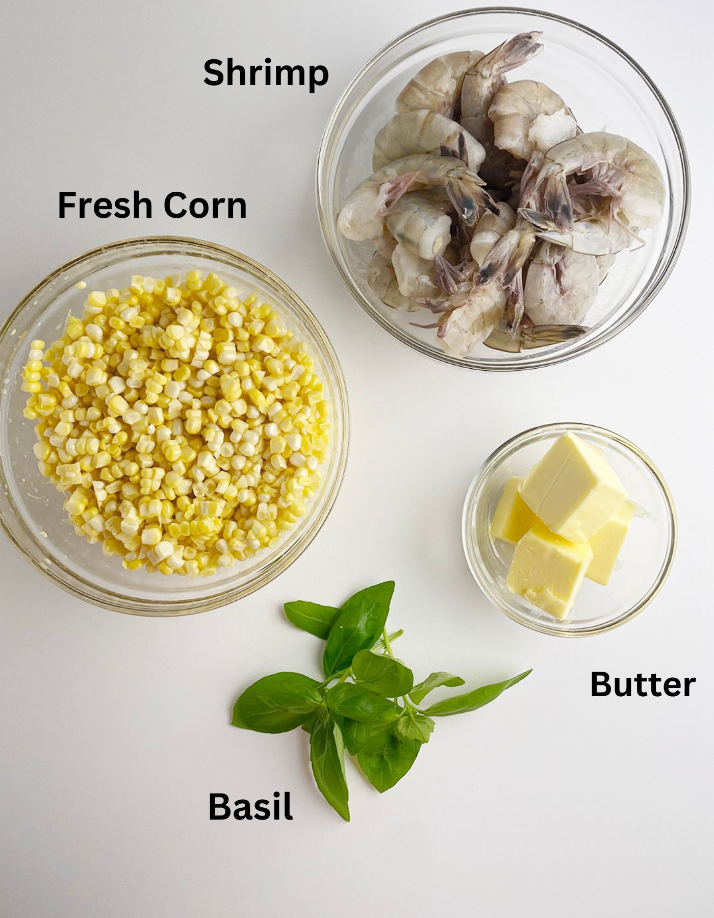 Ingredients needed for buttered shrimp with corn.