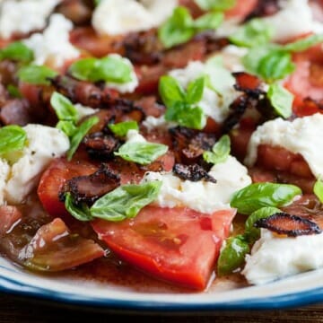 Bacon caprese salad on a plate.