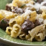 Filet mignon pasta on a plate.