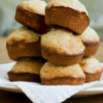 Stack of banana muffins on a plate.