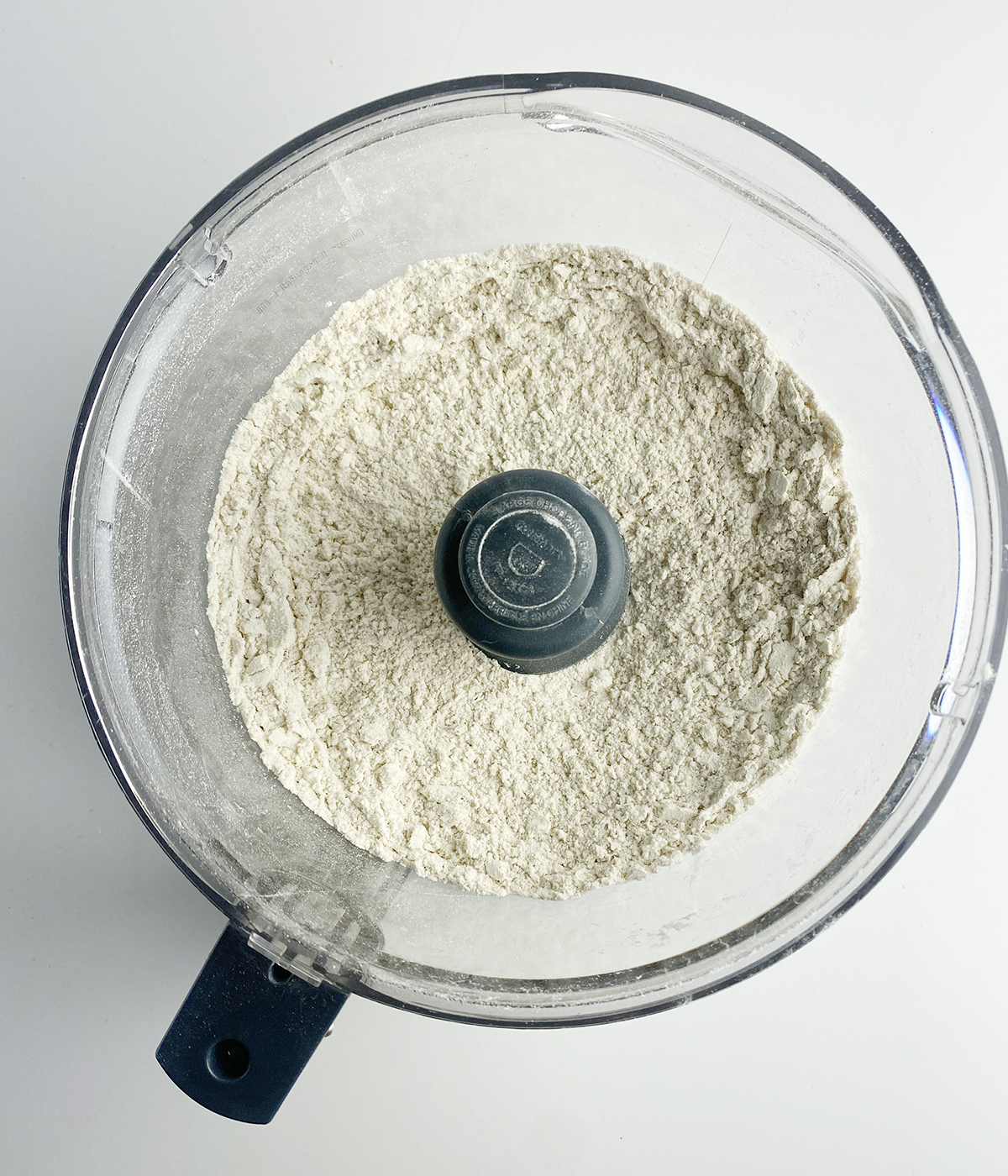 Flour and oats mixture in a food processor.