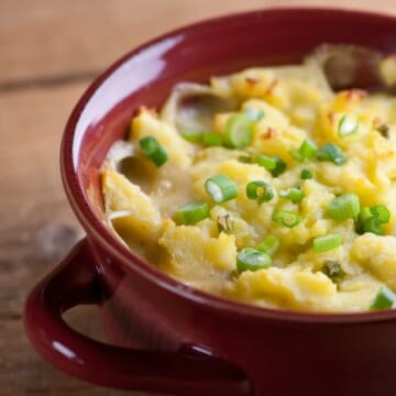 Chicken pot pie with mashed potato crust in a casserole dish.