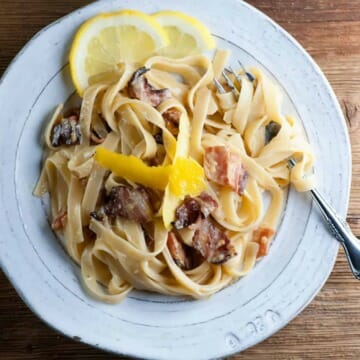 Lemon pasta carbonara on a plate.