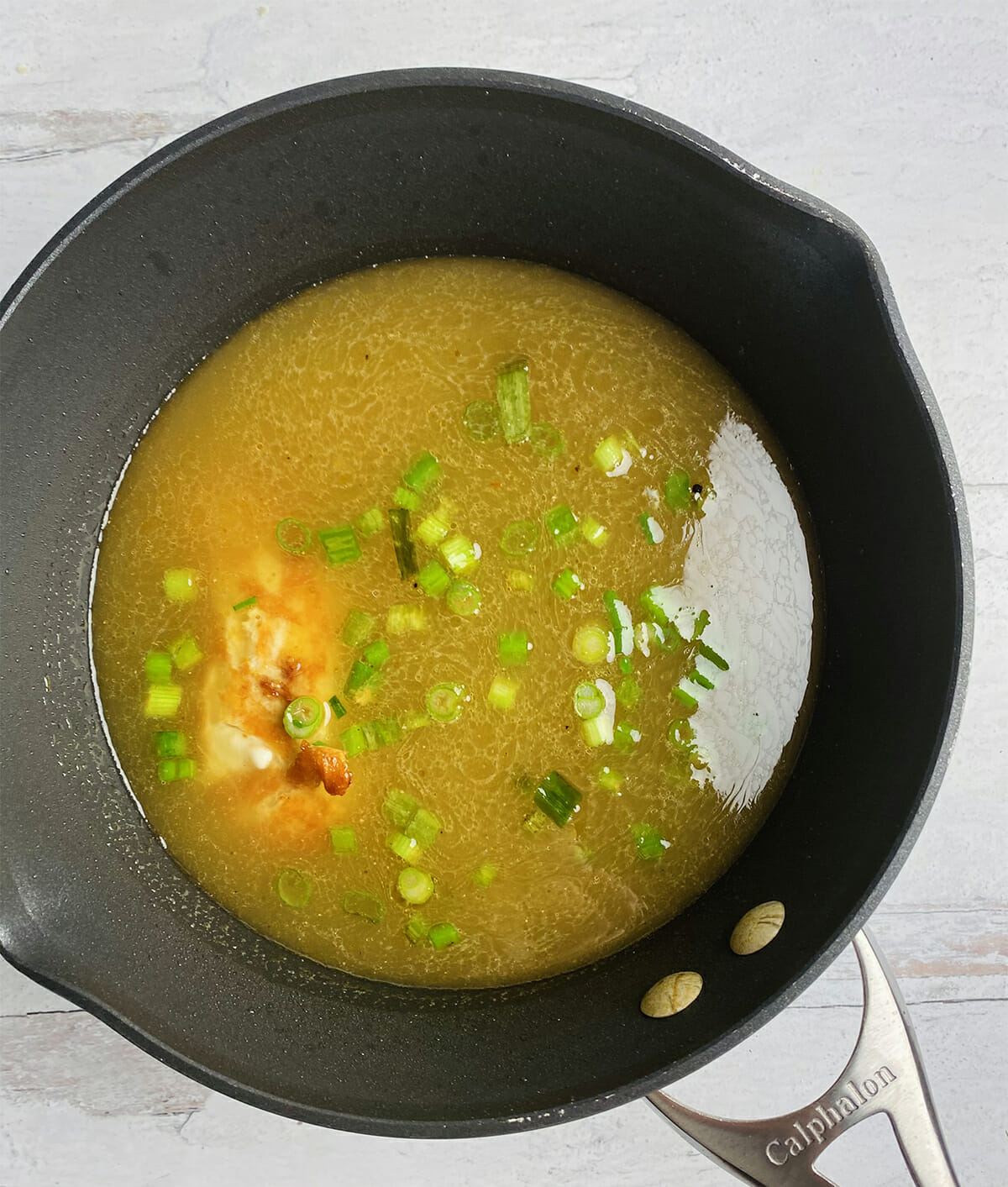 chicken ramen soup chicken broth simmering