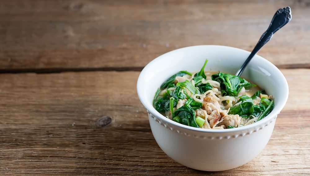 Chicken ramen soup in a bowl.