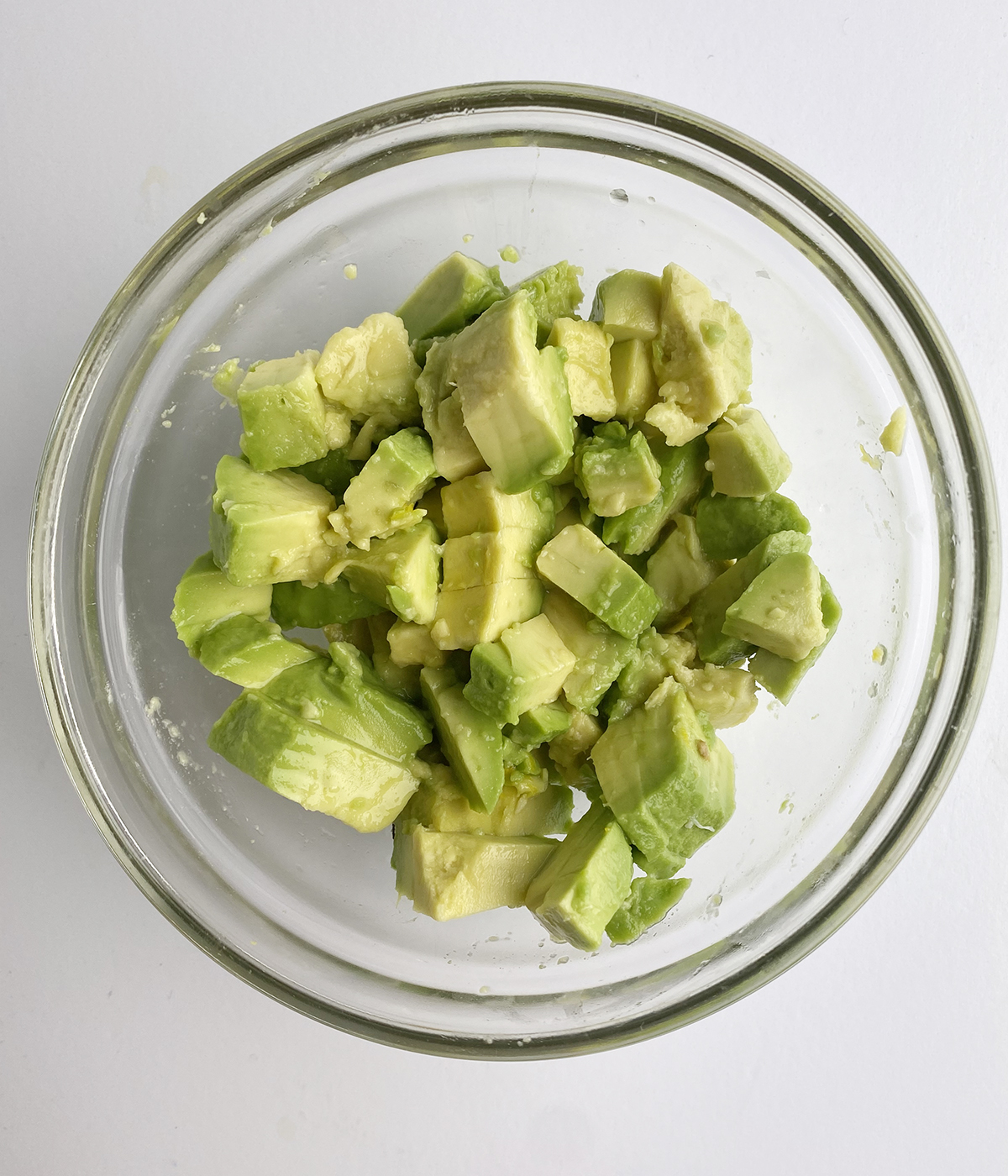 Chopped avocado in a bowl.