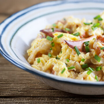 Lobster scrambled eggs in a bowl.