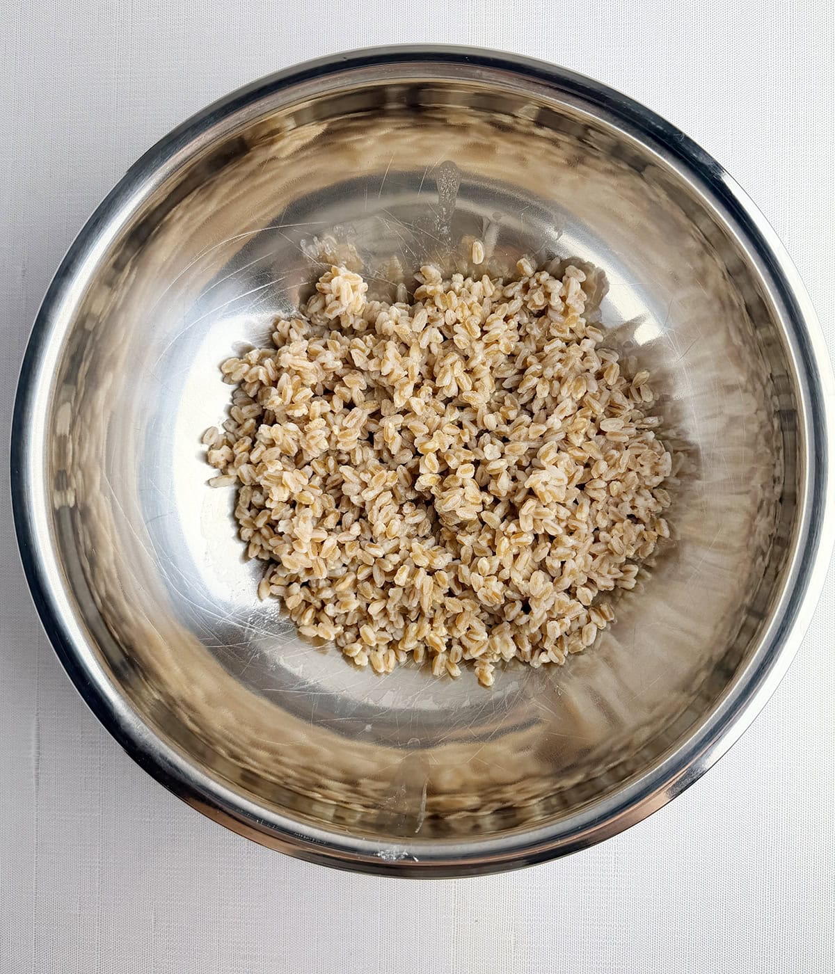 Cooked farro in a mixing bowl.