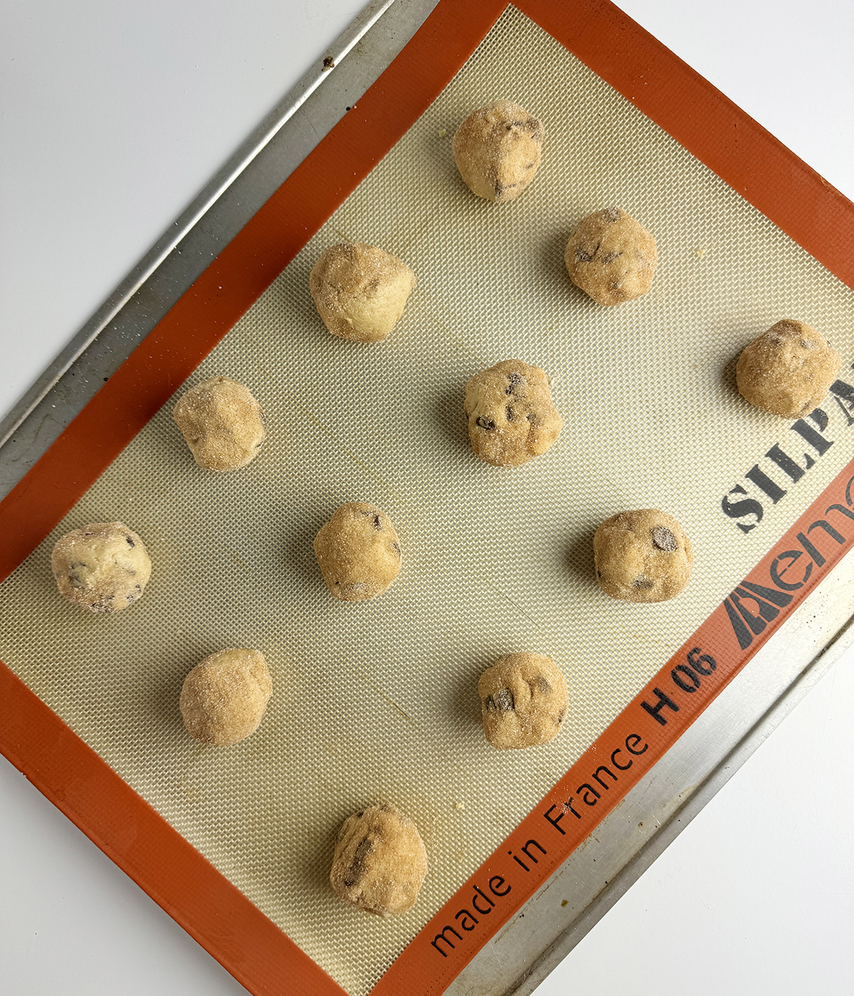 Cinnamon chocolate chip cookie dough ready for the oven.