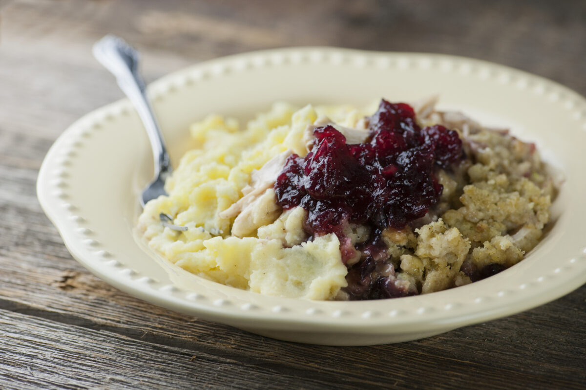 Thanksgiving Casserole on a bowl with a fork.
