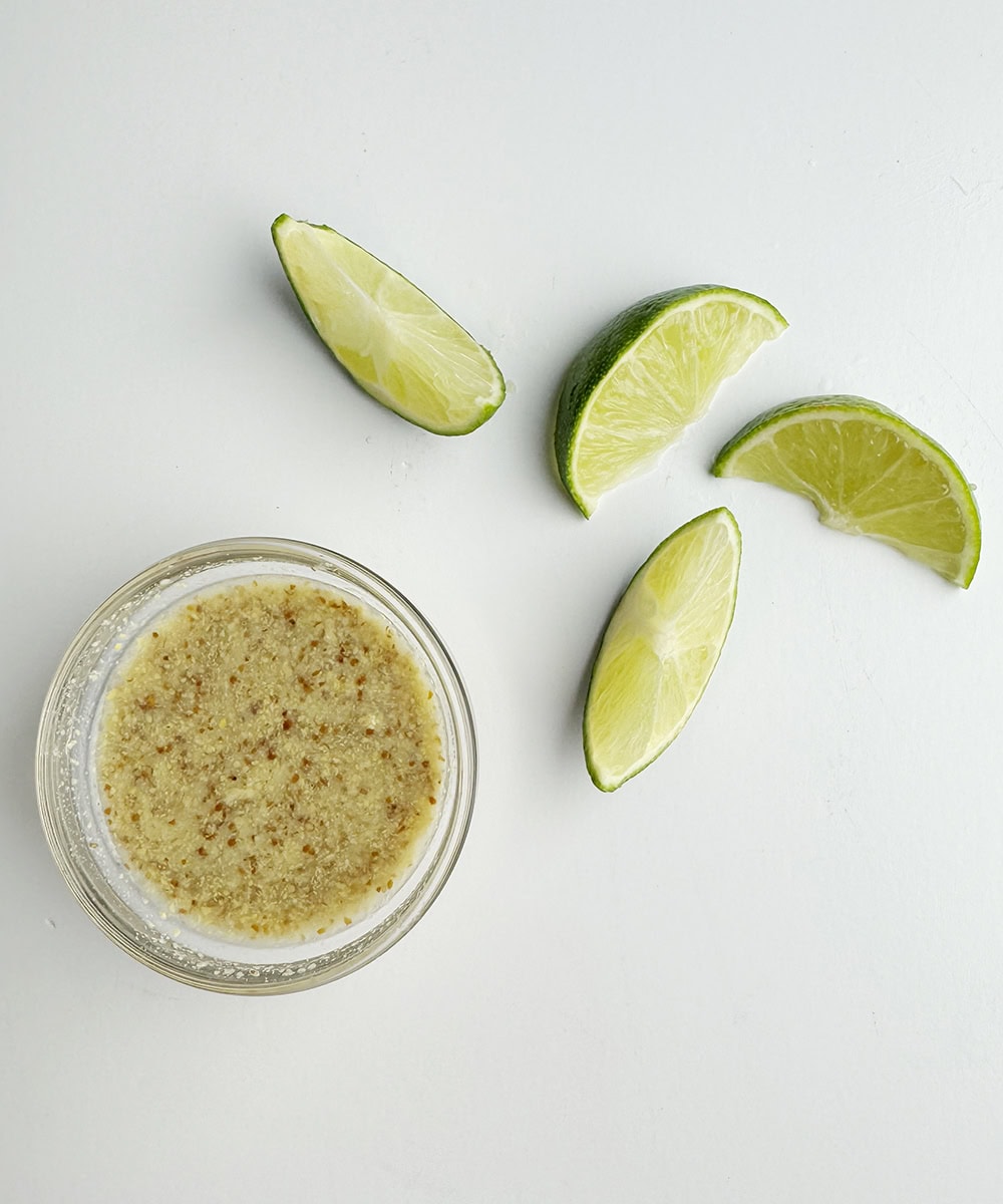 Mustard dressing with lime slices.