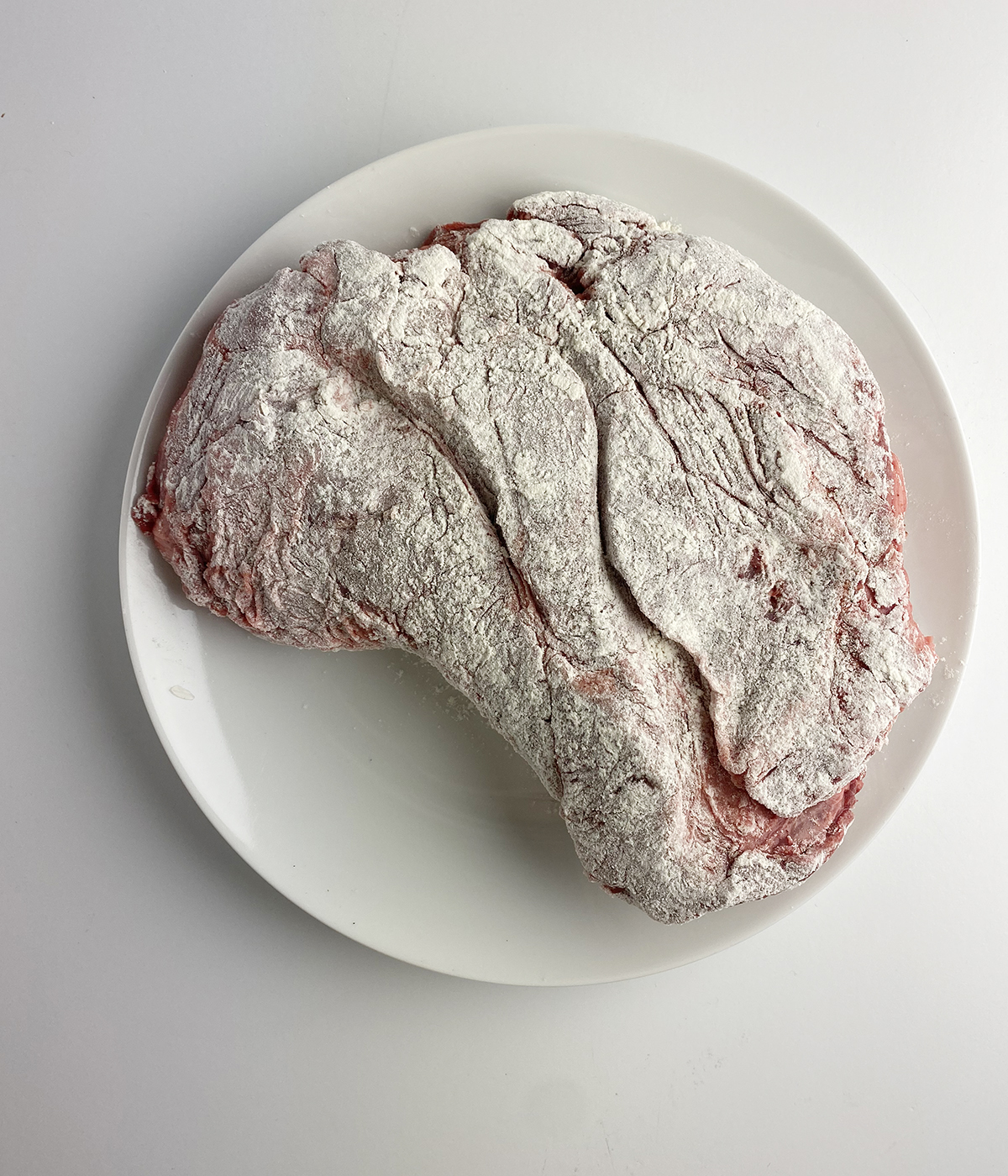 Flour dredged chuck roast.