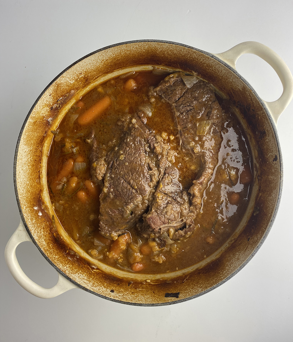 Pot roast cooked in a Dutch oven.